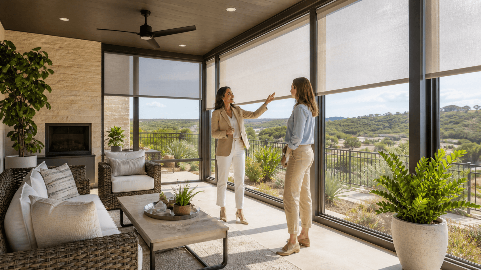 Sunlit patio room with large windows, beige seating, ceiling fan, and leafy plants in warm Texas light